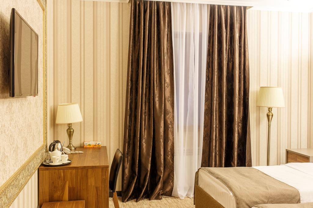 Astor Hotel & Spa Biškek Pokoj fotografie